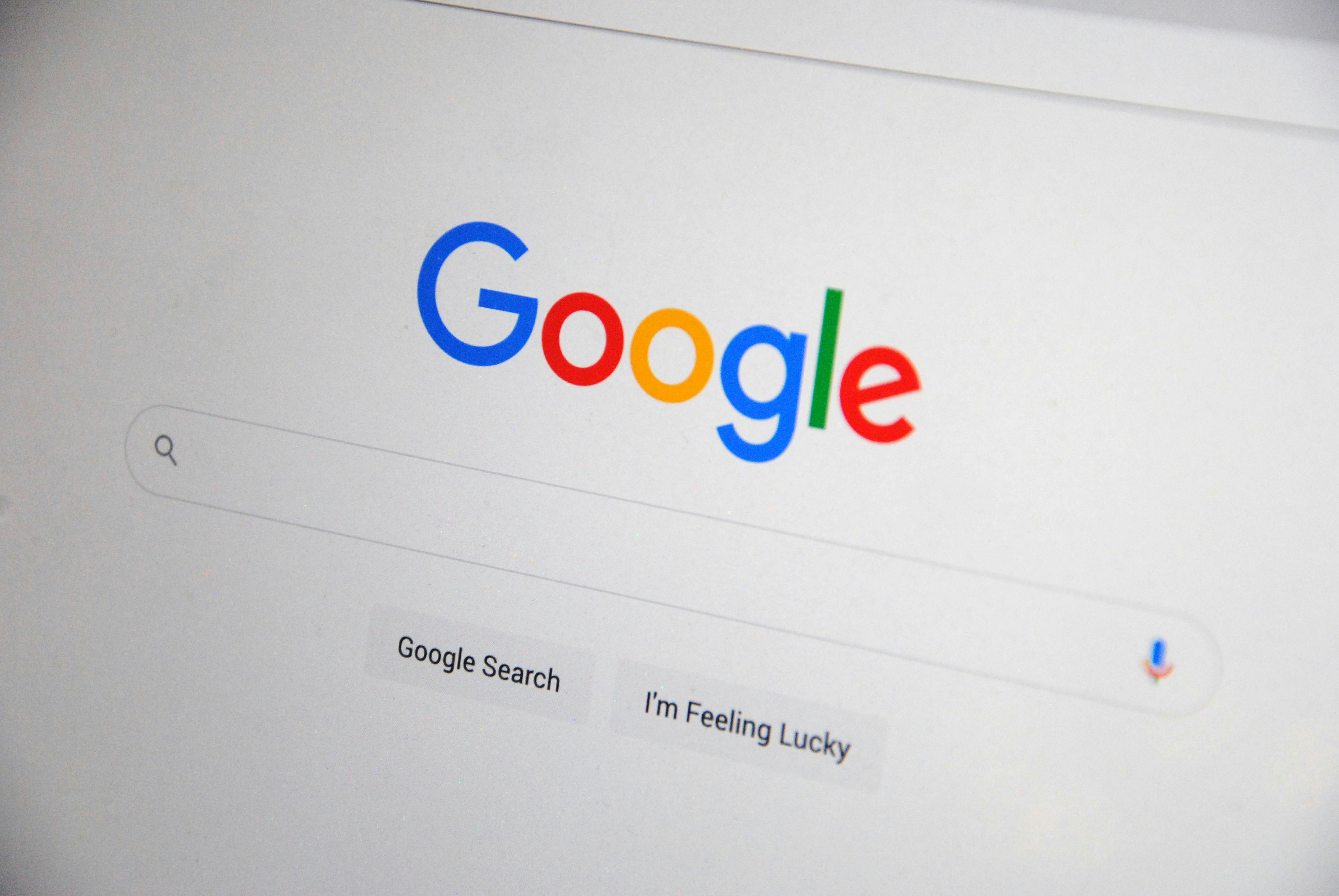 Searching on Google on a laptop screen